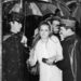 1964-ben így érkezik Jacques Demy filmjének premierjére Catherine Deneuve. A film címe: Cherbourgi esernyők, Deneuve a főszereplő.