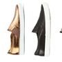 Az egyik cipő a képen csak 6 ezer forint, egy másik meg 133 ezer. Kitalálja, melyik ezek közül a designer-verzió?