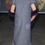 2001-ben az akkor 11 éves Emma Watson tollboával és lila csizmával viselte a földig érő szürke ruhát élete első vörös szőnyeges eseményén a Harry Potter és a bölcsek köve londoni premierjén 2011-ben.
